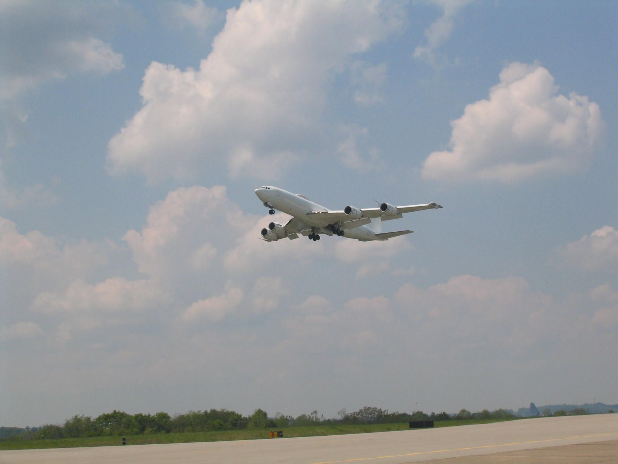Boeing 707-100 — - The Navy E-6 Mercury variant of the 707, shooting approaches at HTS.  A rare visitor.