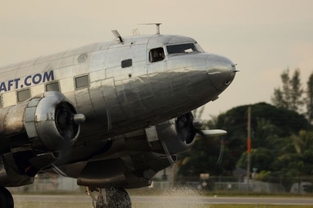 Douglas DC-3 — - Taxiing in at KOPF