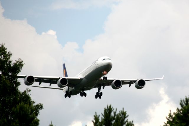 Airbus A340-600 (D-AIHV) - June 23, 2013 coming in 18C