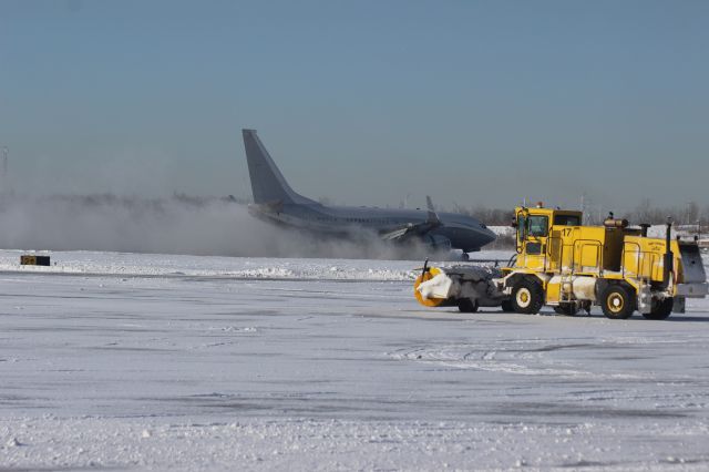 — — - Broom watching full braking of 737 on Runway 30 at Gary Regional Airport.