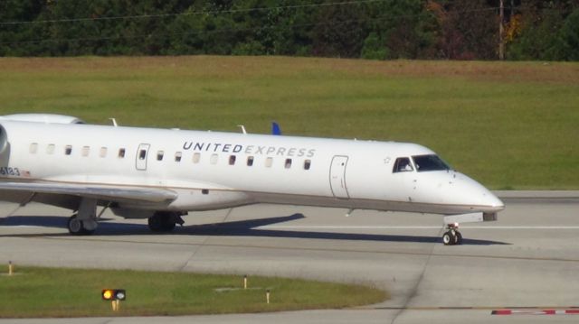 Embraer ERJ-145 (N16183) - Turning off runway 5L.
