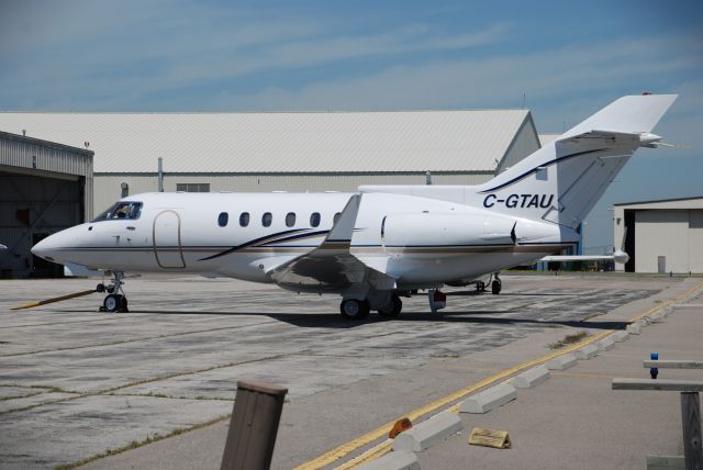 Hawker 800 (C-GTAU) - Hot looking Hawker 800A with winglets. Seen at its home base Pearson Airport, July 15/08.