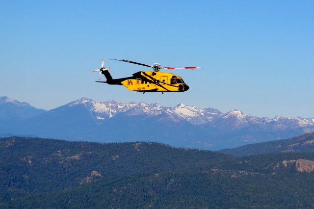 Sikorsky Helibus (N924PH) - Taken between KRDD and KPDX, Northern California near Castle Crags.  One of two PHI S-92A enroute from KLFT to PASC to support exploratory drilling in the Arctic in 2012.