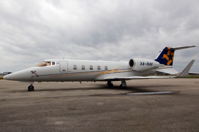 Learjet 60 (XA-RAV) - Mexican based Lear 60XR on the ground in Daytona after Hurricane Sandy has passed.