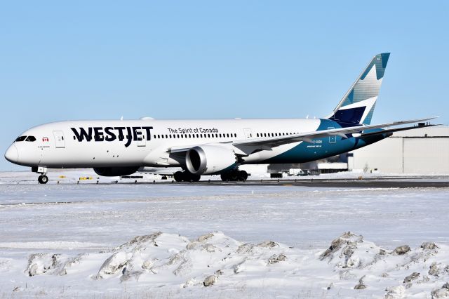 Boeing 787-9 Dreamliner (C-GUDH) - Westjet's brand new Boeing 787-9 Dreamliner departing YYC on Mar 3.