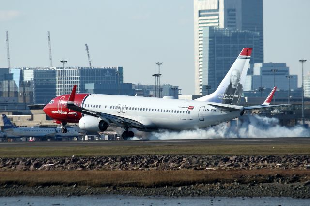 Boeing 737-800 (LN-NIH) - Christopher Columbus touching down on 22L