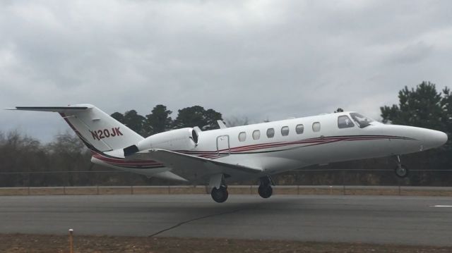 N20JK — - 2002 Cessna Citation CJ2 departing Mountain View on an overcast day