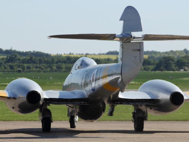 — — - Gloster Meteor taxies out to the runway as part of the Jubilee themed event at Duxford Air Museum.