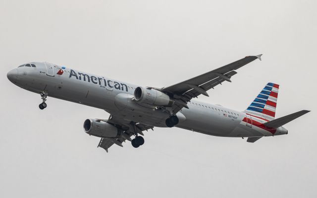 Airbus A321 (N974UY) - through the noticeably low clouds arrived a gorgeous former US Airways ship.