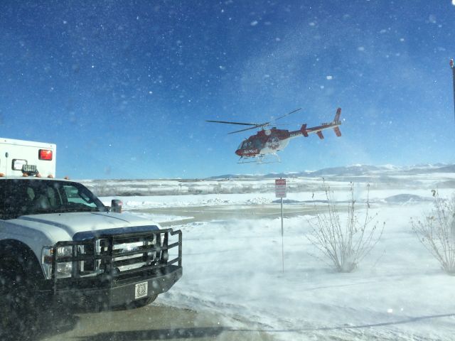 Bell 407 (N470YR) - Backup Med Evac helicopter lifting from the helipad at Middle Park Medical Center, Granby, CO