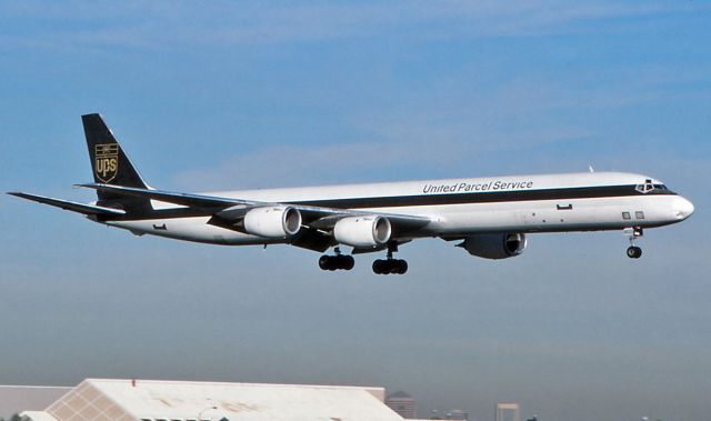 McDonnell Douglas DC-8-70 (N803UP) - Dec. 1996 - about to touch down at PHX.