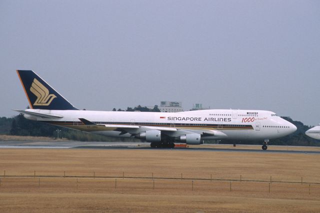 Boeing 747-400 (9V-SMU) - Departure at Narita Intl Airport Rwy16R on 2001/03/20 " 1000th Boeing 747 "