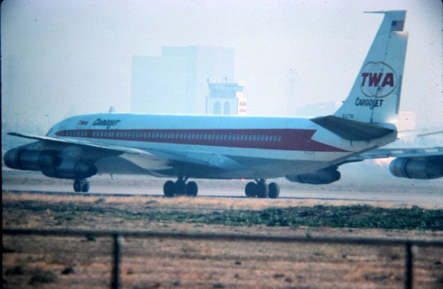 Boeing 707-100 (N14791) - KSJC - Mid 1970s rare shot of a TWA Cargojet diverted to SJC due to poor visibility at SFO - San Jose wasnt much better visibility wise but there was also a American Airlines 707 and a United DC-8 Freighter here also when I took this photo.