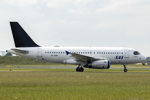 OY-KBP — - Close to Runway 22R inside the Airport