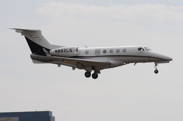 Embraer Phenom 300 (N862LG) - Landing at John Wayne Airport, July 18 2018. 