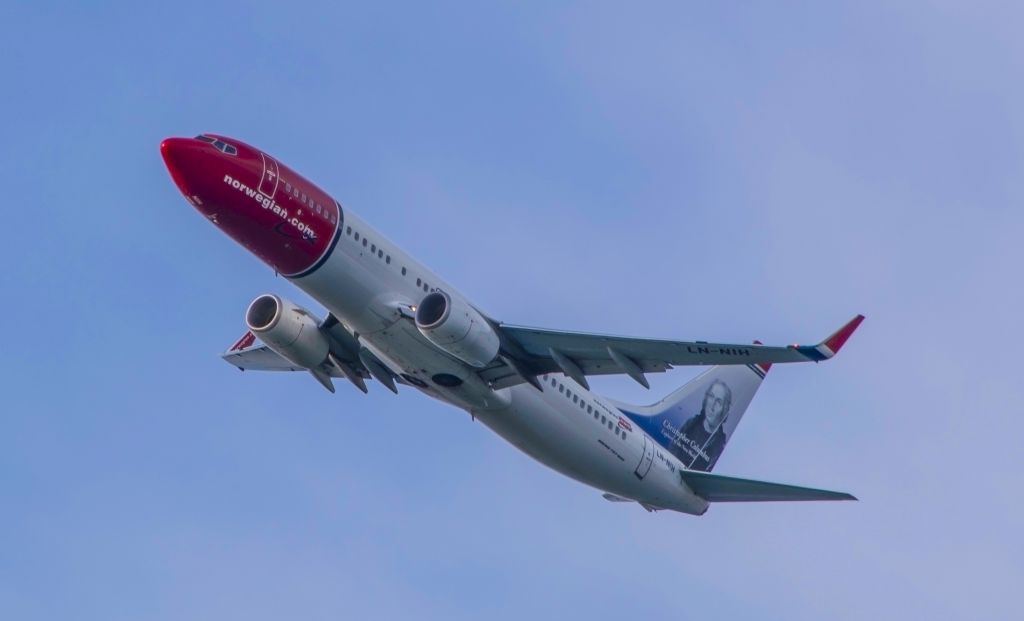 Boeing 737-800 (LN-NIH) - Christopher Columbus going considerably faster than the Santa Maria went, climbing away from BOS.