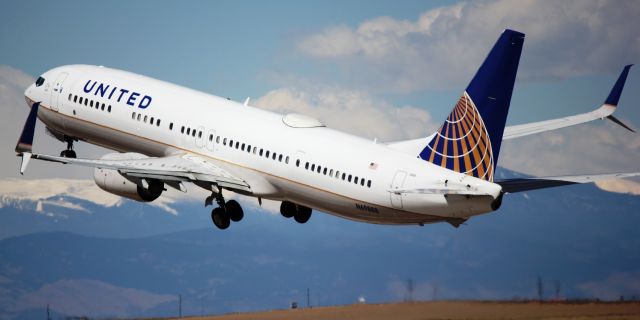 Boeing 737-900 (N69888) - Departing from runway 25 for San Diego.