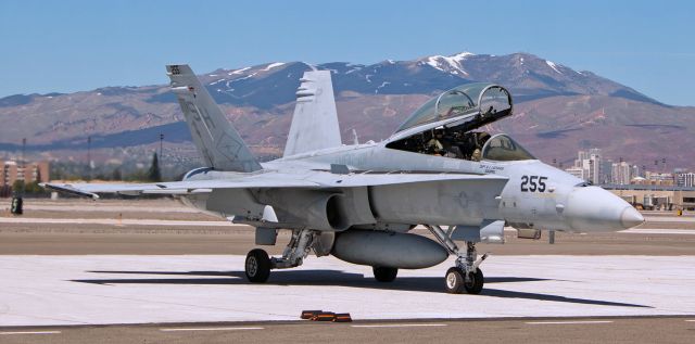 McDonnell Douglas FA-18 Hornet (16-4203) - ** My most very sincere Thanks go to Todd, Maggie, and Robert for the wonderful assistance that made it possible for me to capture the arrival of my former high school student. **br /br /United States Marine Corps Major Lorne "Yardsale" Christopher comes into view in the rear seat as the cockpit canopy of this VMFAT-101 (Marine Fighter Attack Training Squadron 101) "Sharpshooters" F/A-18D Hornet (164203) opens and Maj. Christopher, an instructor pilot stationed at MCAS Miramar, makes his first-ever arrival at KRNO as pilot of an F/A-18 Hornet.  Back in the late 1990s, I was "Yardsales" 9th, 10th, and 11th grade Language Arts teacher at a small high school in Gerlach, Nevada, on the edge of the Black Rock Desert.  The last time he and I saw each other was on the day he was sworn in to the USMC on the quad at the University of Nevada, Reno.  This is a moment I will always, always remember ...  