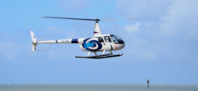 Robinson R-44 (VH-ESK) - Approaching Cairns City Heliport.