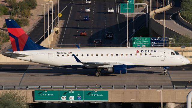 Embraer 175 (N623CZ) - Taxiing across the bridge at PHX.