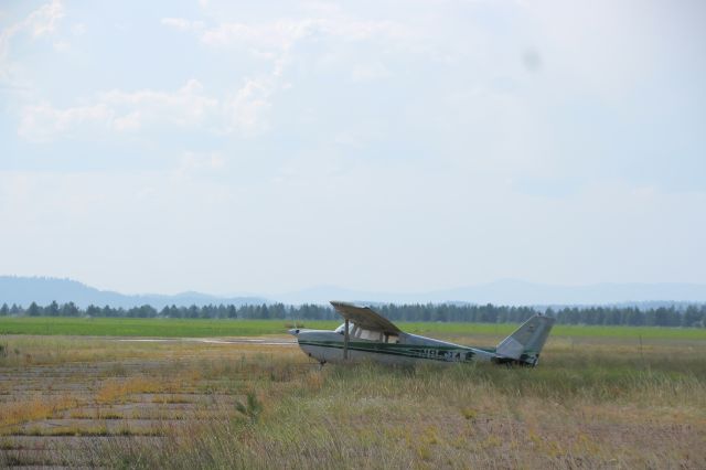 Cessna 175 Skylark (N8084T) - This Skylark has been sitting in the corner of the airport alone for as long as I can remember. Interestingly, its registration is printed twice, once on the vertical stabilizer, and once on the fuselage.