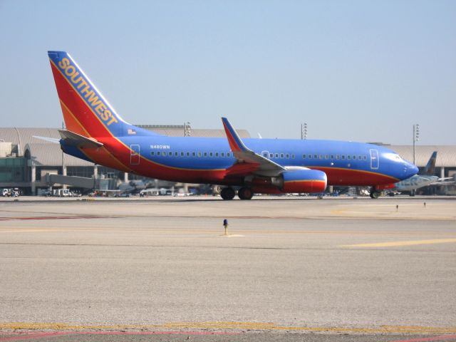 Boeing 737-700 (N480WN) - Holding on RWY 19R