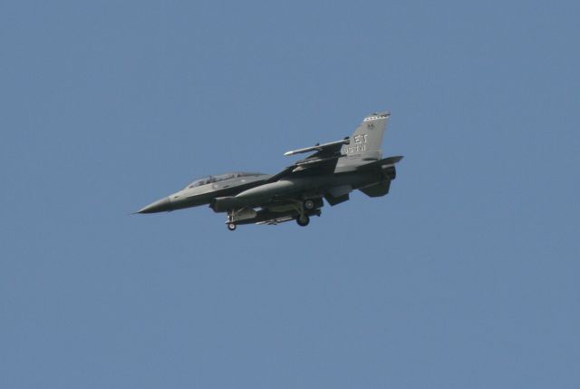 Lockheed F-16 Fighting Falcon — - F-16 Fighting Falcon. I was driving north out of Destin passing Eglin AFB where they had numerous jets performing touch and gos. I pulled over and took photos of this impromptu airshow.