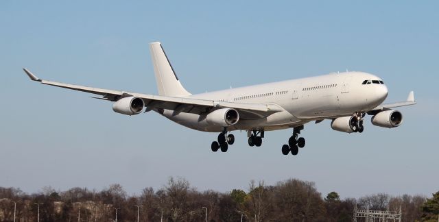 Airbus A340-300 (9H-FOX) - A Hi Fly Malta 1997 model Airbus A340-313 on final to Carl T. Jones Field, Huntsville International Airport, AL - January 23, 2022.