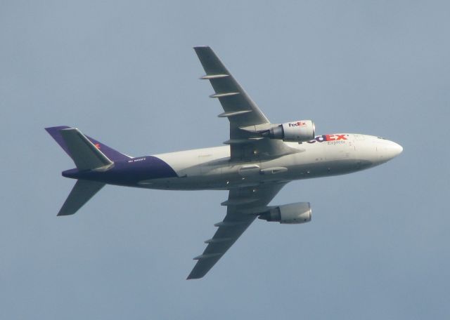 Airbus A310 (N405FE) - Off of runway 23.