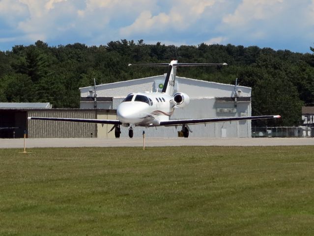 Cessna Citation Mustang (N404CM) - Taxiing out for a departure runway 22.