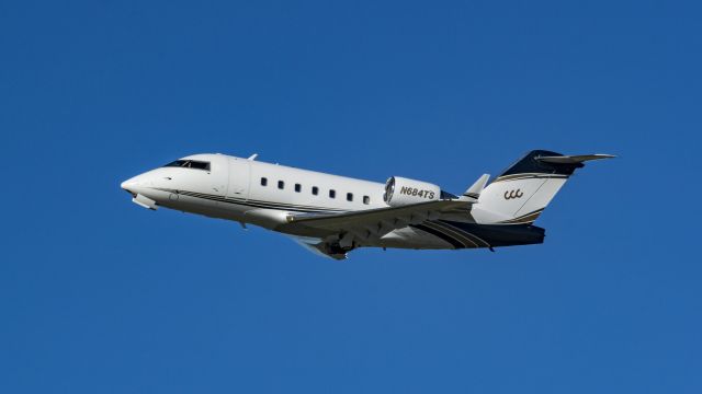 Canadair Challenger (N684TS) - Departing 31L