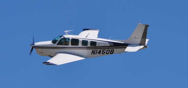 Beechcraft Bonanza (36) (N1450B) - Photo taken by Duane Deniston at KTKX.  I was leaving KTKX for KBNA.