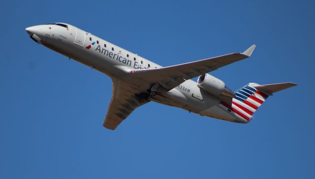 Canadair Regional Jet CRJ-200 (N433AW) - A Bombardier CRJ200 cleaning up after takeoff from Runway 18R at Carl T. Jones Field, Huntsville International Airport, AL - October 11, 2016.