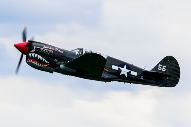 — — - Thom Richard in his beautiful Curtiss P-40 Warhawk named American Dream performing at the National Warplane Museum - Geneseo Airshow.