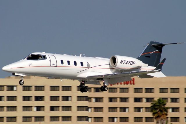 Learjet 60 (N747DP) - On final at LGB