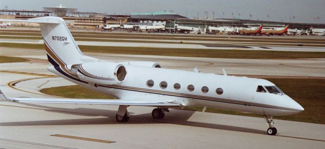 Gulfstream Aerospace Gulfstream IV (N702GH) - Taxis past the Air Terminal Museum way back in 2005.