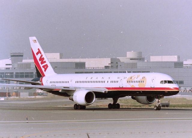 Boeing 757-200 (N713TW) - KSFO - Millbrae Airpark photo about Dec 2000 just after the then new terminal opened - this TWA 757-2 headed for Runway 1R for departure to STL or points east. This jet delv new to TWA in 1997 and taken by American Dec 2001 - then sold to Delta about 2007. CN: 21873 LN: 764