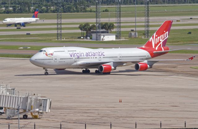 Boeing 747-200 (G-VGAL) - This photo was taken on the top level of the parking garage at Orlando International Airport.  