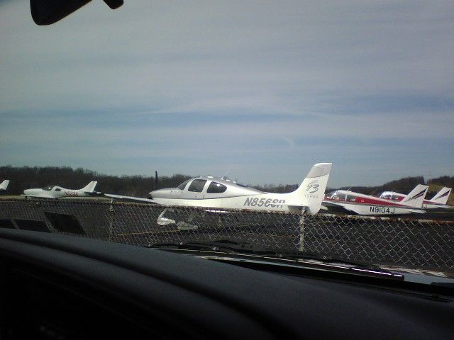 Cirrus SR-22 (N856SR) - Cirrus SR-22 parked on ramp at Washington County with many other planes.