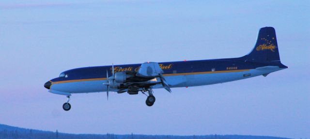 Douglas DC-6 — - Returning from another run.