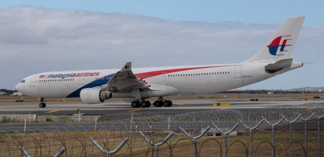 Airbus A330-300 (9M-MTC) - Malaysia A330-300 taxiing to gate after arriving on runway 19R