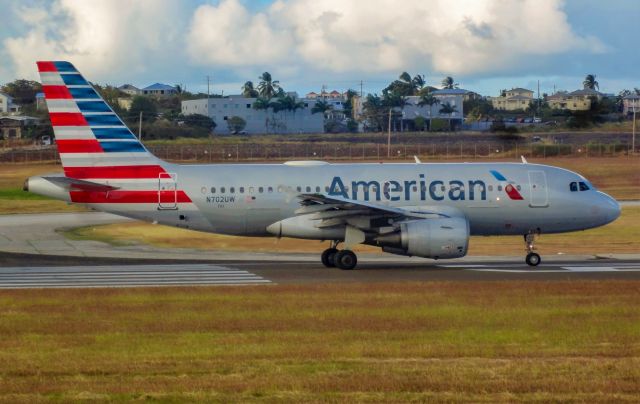 Airbus A319 (N702UW) - AAL612 from Barbados to Charlotte commencing takeoff roll on runway 09.