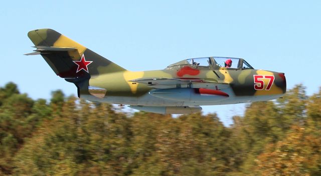 PZL-MIELEC SBLiM-2 (NX157GL) - A Red Star Aero Polish-built Mikoyan Gurevich MiG-15 UTI on a low pass during Aviation Career Day 2022 at St. Clair County Airport, Pell City, AL - October 8, 2022.