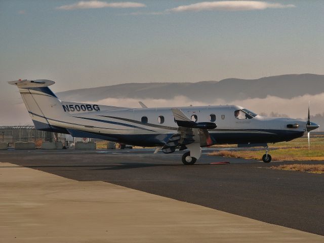 Pilatus PC-12 (N500BG) - A late morning departure after fog burns off.