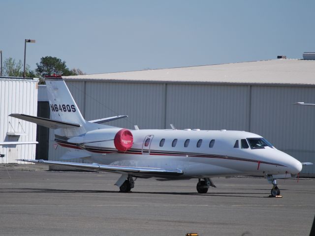 Cessna Citation Excel/XLS (N648QS) - Parked at Wilson Air Center - 4/4/09