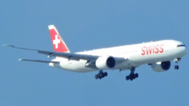 BOEING 777-300ER (HB-JNC) - A Formidable Swiss B777-300ER Reg#HB-JNC"Arriving from Zurich,Kloten(ZRH/LSZH)