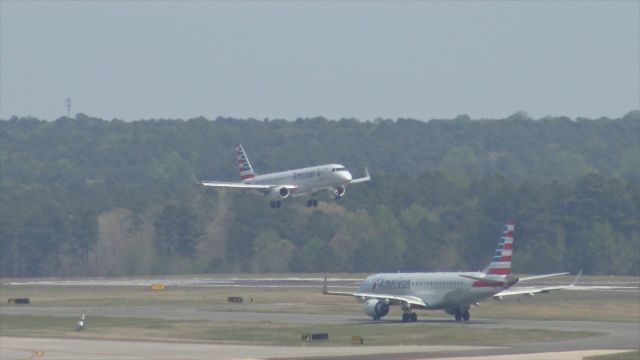 Embraer ERJ-190 (N953UW) - American Airlines flight 2081, arriving from LaGuardia. Taken from the parking deck at RDU