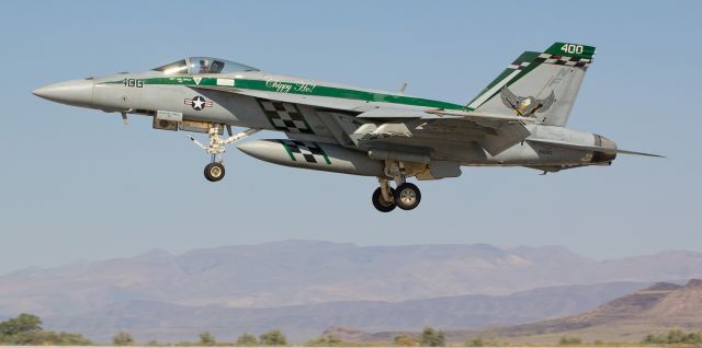 McDonnell Douglas FA-18 Hornet (16-6901) - The CAG bird of the VFA-195 "Dambusters," an F/A-18E Super Hornet, flashes past my position as it is about to touch down on runway 31L at NAS Fallon.  The "Dambusters," formerly flying from the USS George Washington (CVN-73) and home ported at NAF Atsugi, are temporarily homeless while awaiting the completion of their cross decking reassignment to USS Ronald Reagan (CVN-76).  