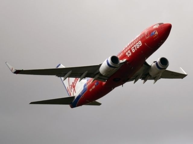 Boeing 737-700 (VH-VBF) - Getting airborne off runway 23.