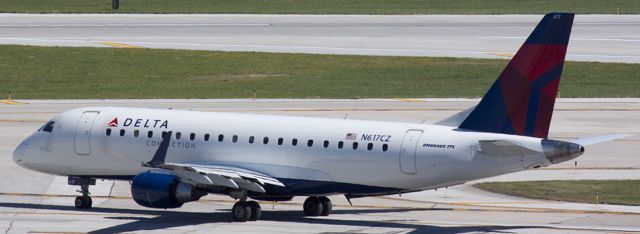 N671CZ — - Standing on the top level of the parking garage.